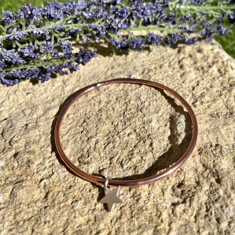 Copper bangle with star charm Copper bangle with star charm