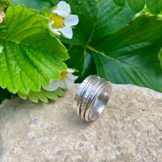 tripe spinner ring