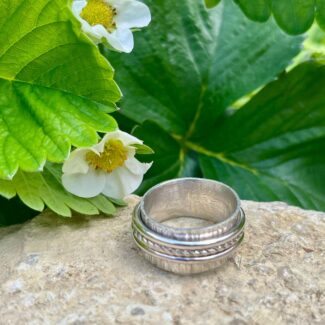 tripe spinner ring