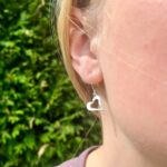 modelled open heart earring